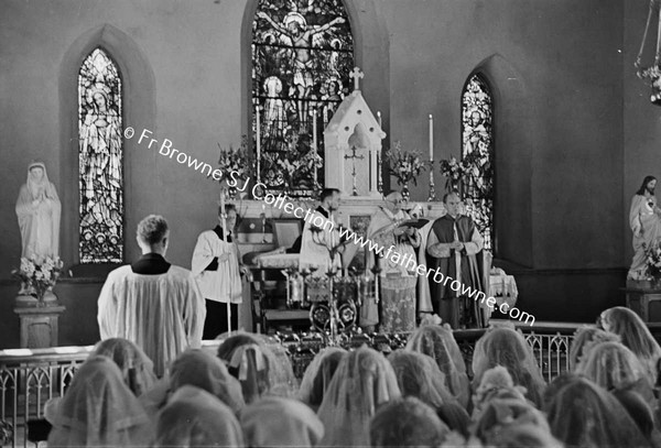 BISHOP READS FINAL PRAYERS